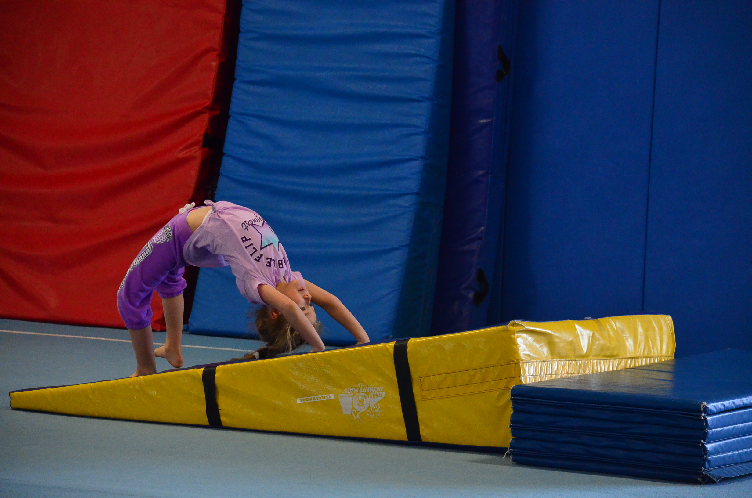 Young Girl Practicing Gymnastics